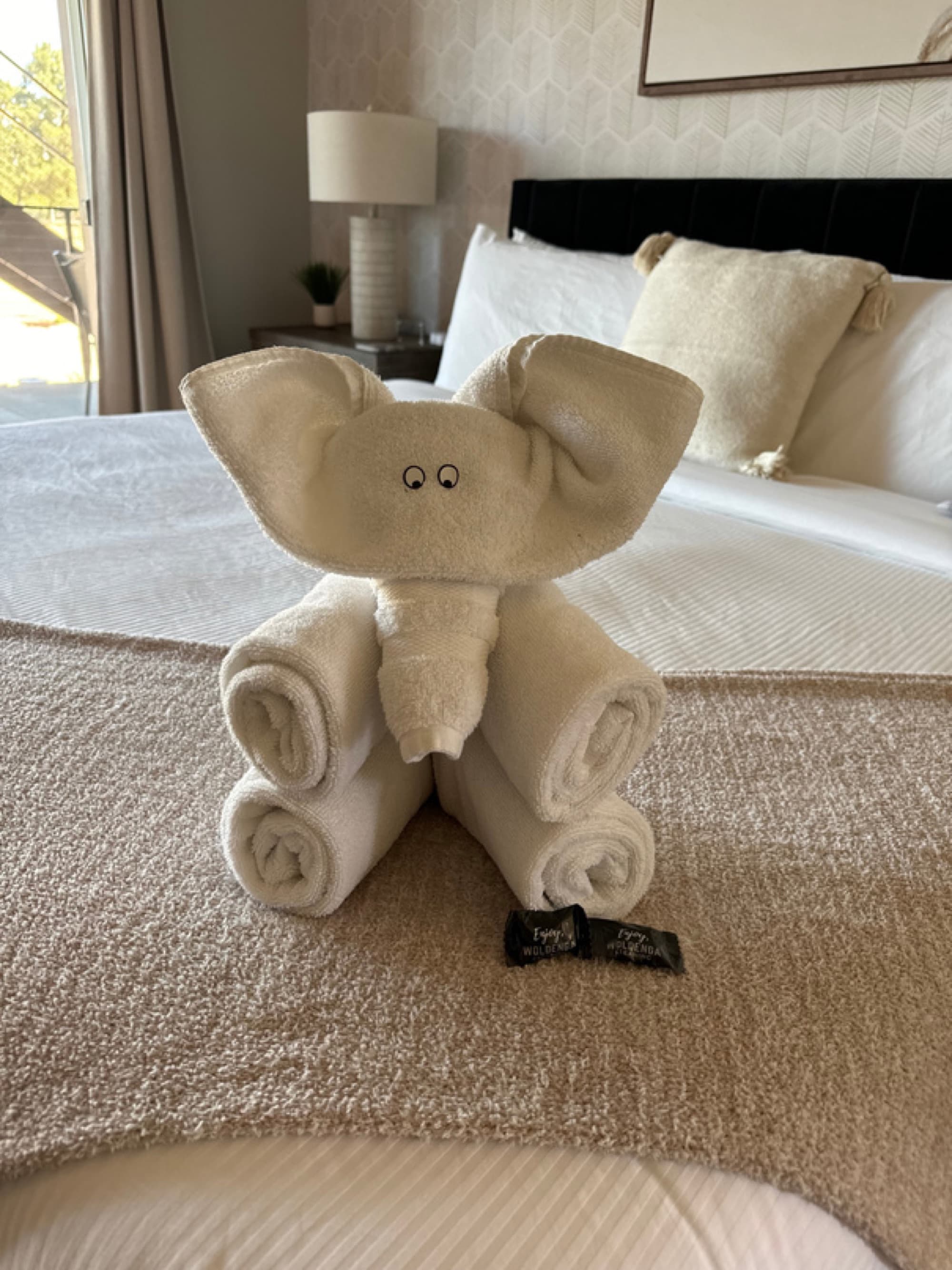 A signature towel-origami welcome detail